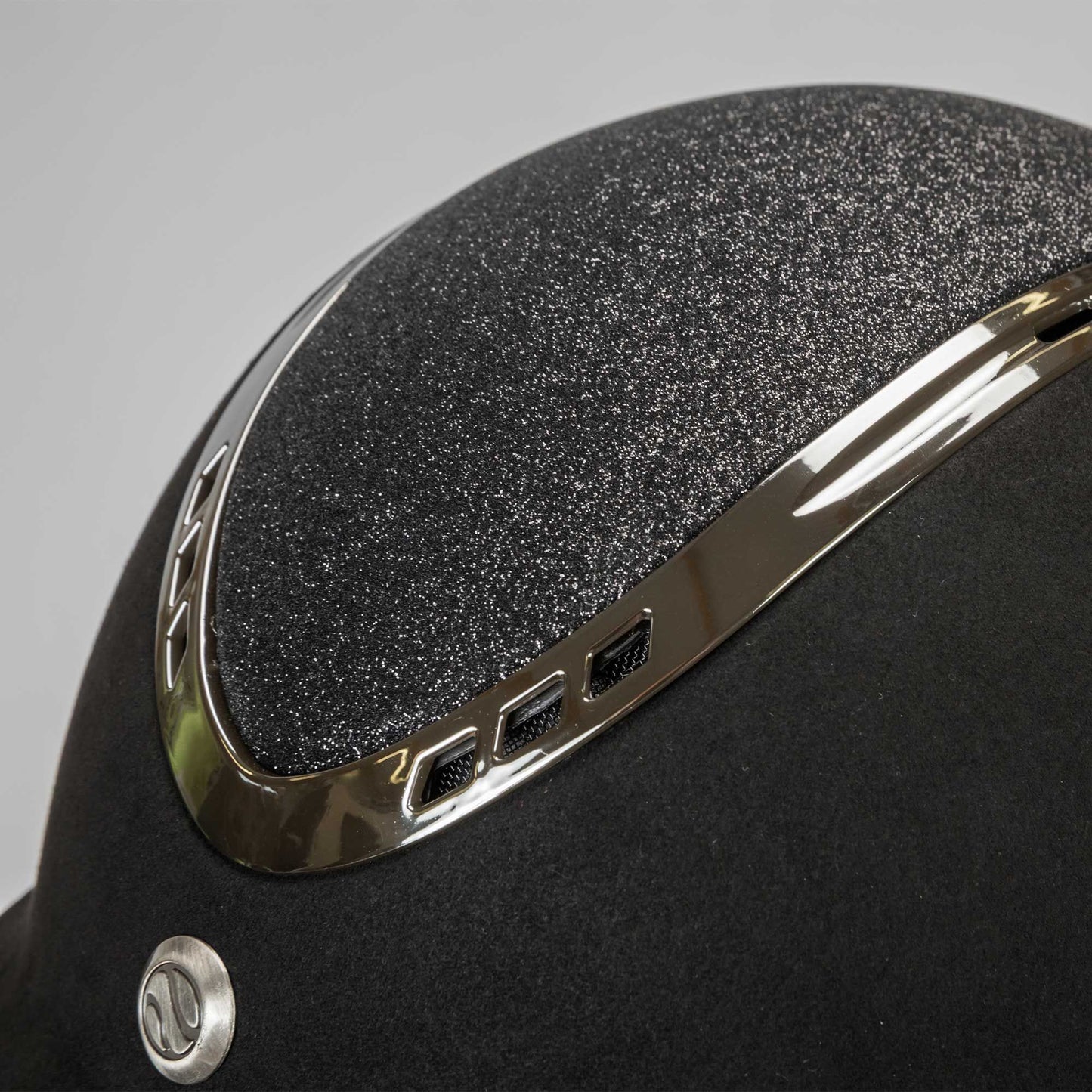 close up view: black riding helmet with sparkle