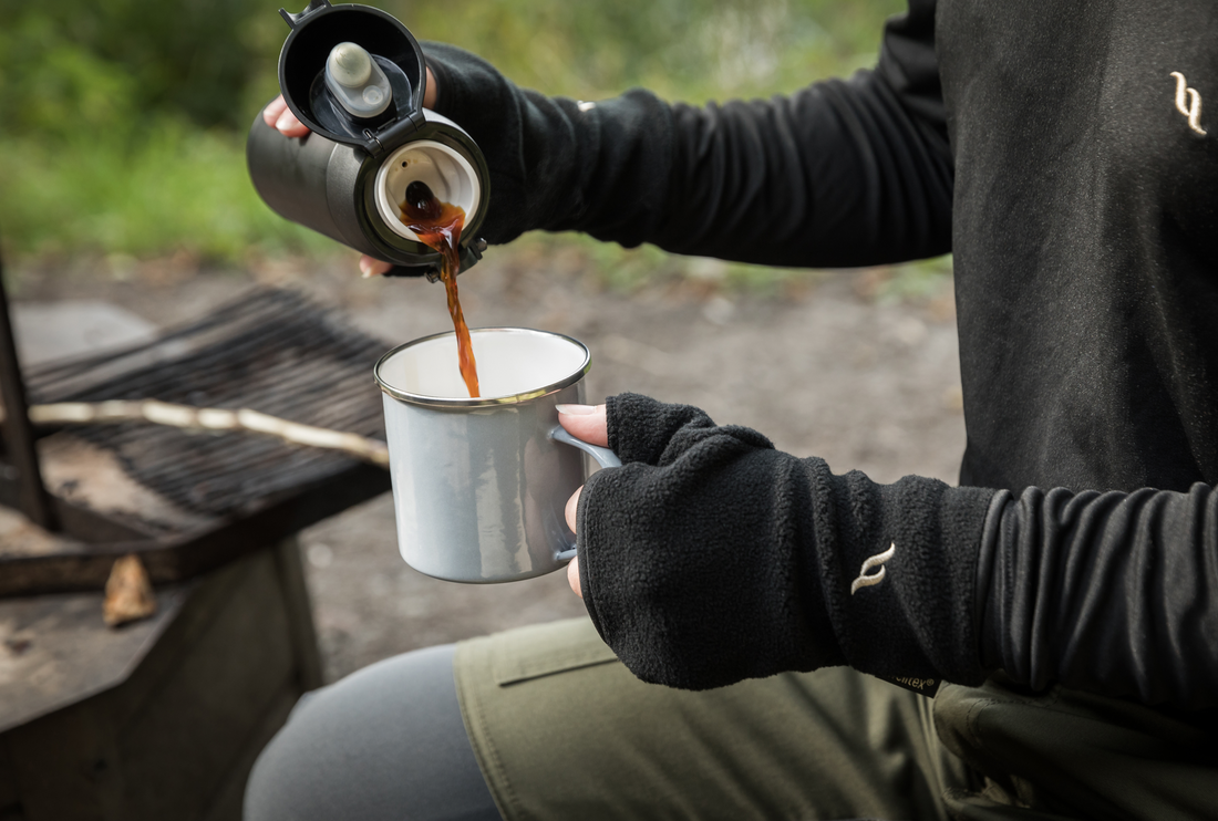 Man wearing Welltex fabric products in camping environment