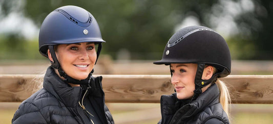 two blonde women wearing pardus helmets