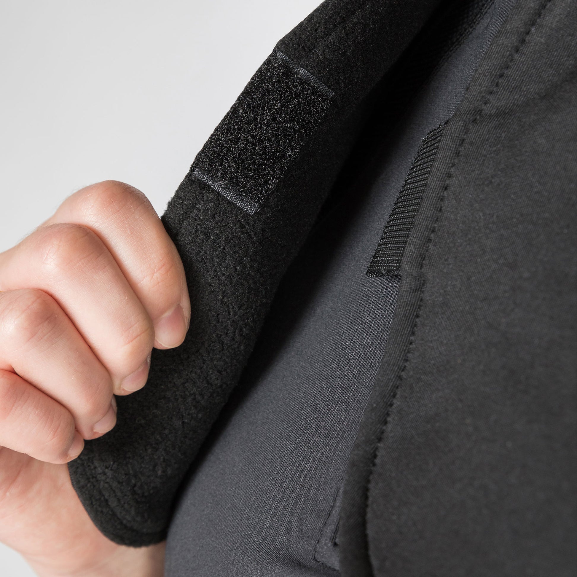 close up detail of velcro on neck cover