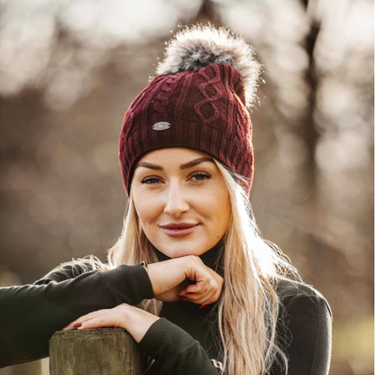 burgundy beanie being worn by women