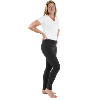 black leggings and white V-shirt worn by women 