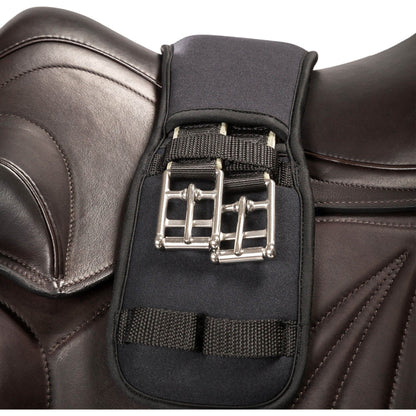 fixed welltex lined girth, black, placed on a saddle