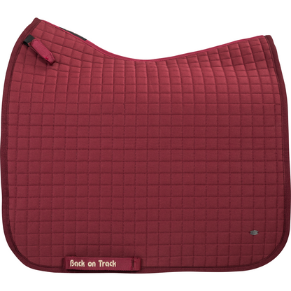 burgundy dressage saddle pad with gold BOT and metal logo tag