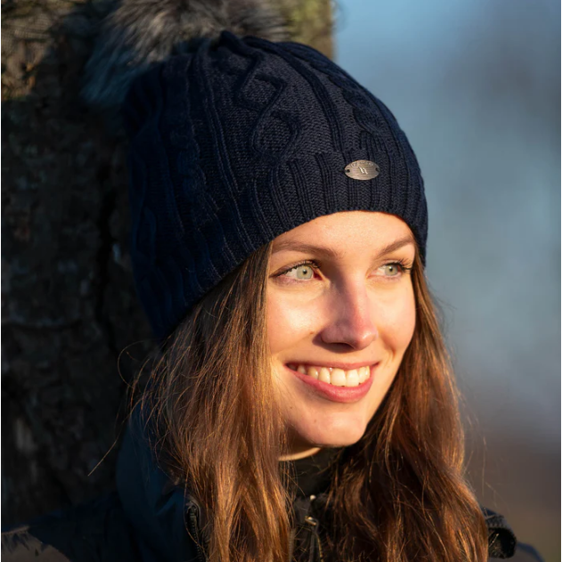 navy beanie being worn by women