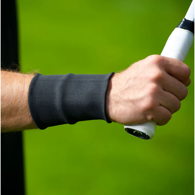 a tennis player wearing a black wrist brace