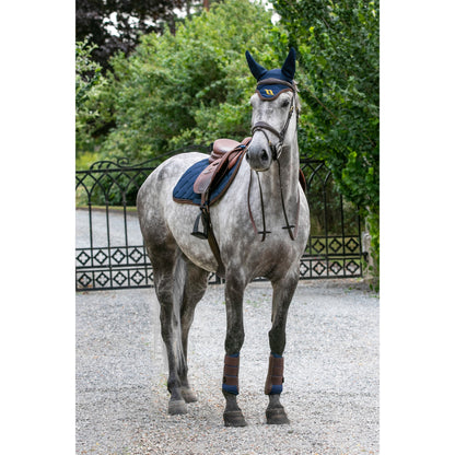 Navy saddle pad and bonet on grey horse, mesh, airflow, breathable