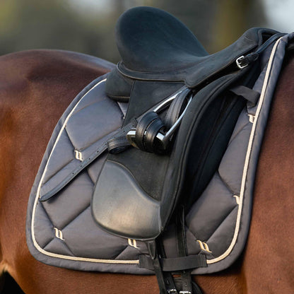 graphite nights collection saddle pad on a horse under saddle