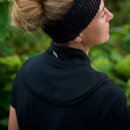 blond women wearing neck cover